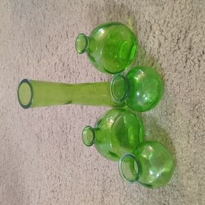 Set of green glass bud vases